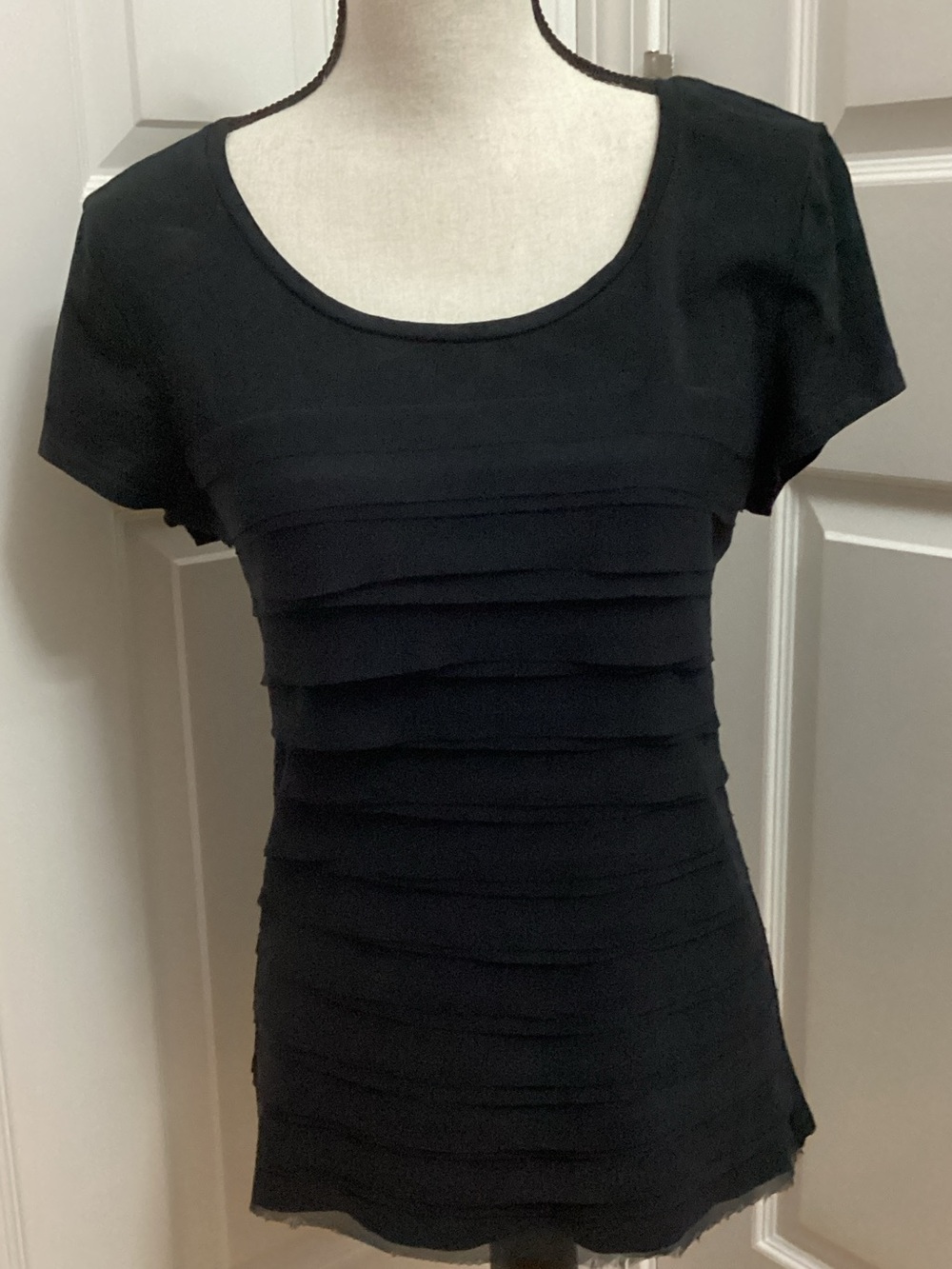 Ann Taylor Black Detailed Tee Shirt with layered ruffle detail, size medium.